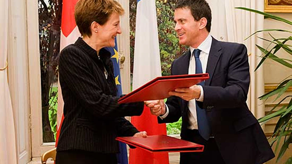Paris, 5.11.2013: conseillère fédérale Simonetta Sommaruga avec Manuel Valls, ministre français de l’Intérieur